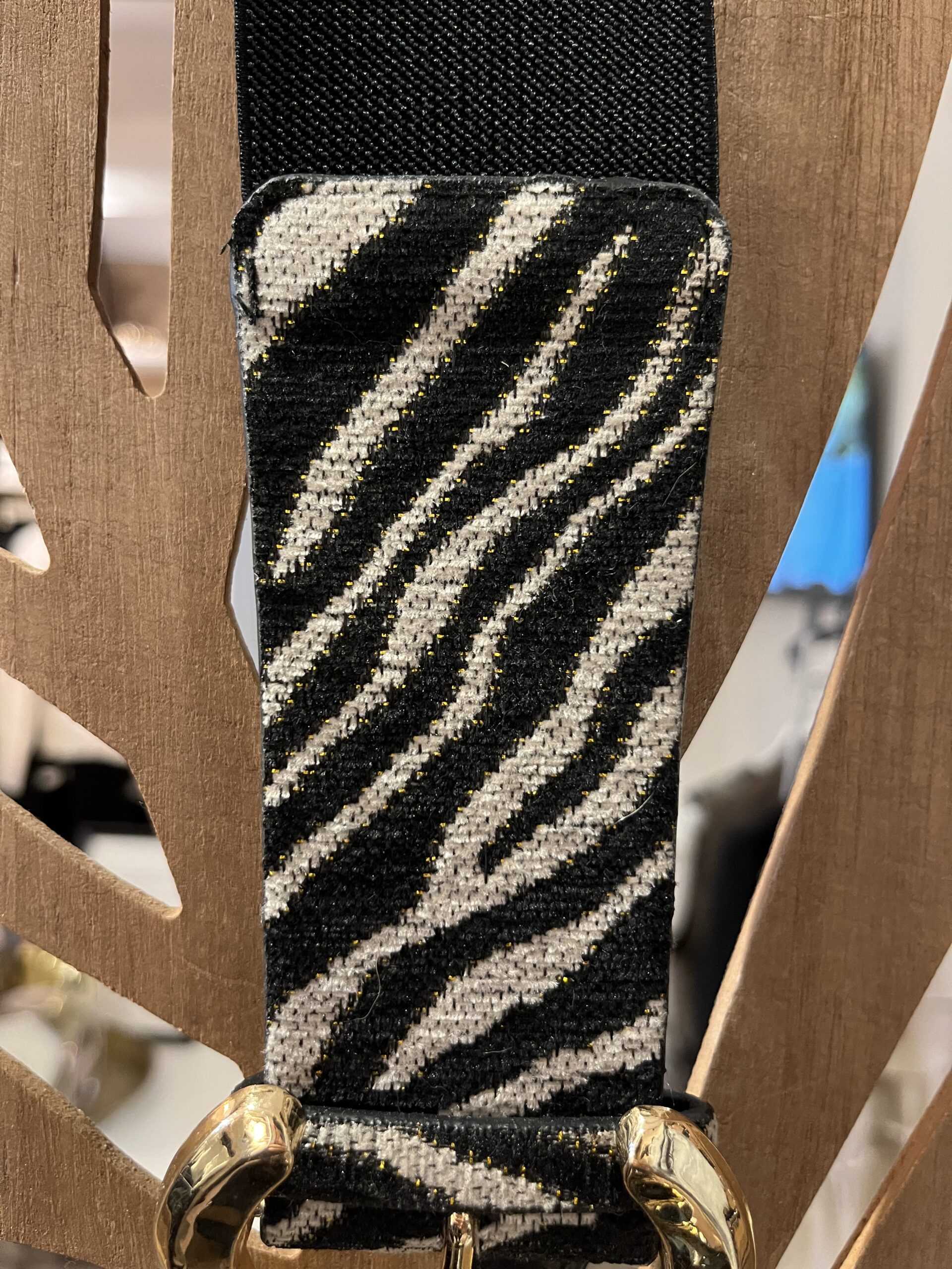 Grijze stretchriem dames met zebraprint en gouden gesp